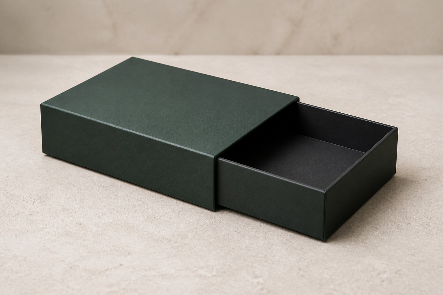 A rigid sleeve box with its inner tray pulled partway out.